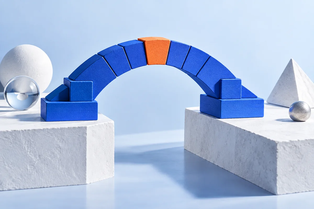 A geometric bridge joining two platforms. AI-created editorial illustration.