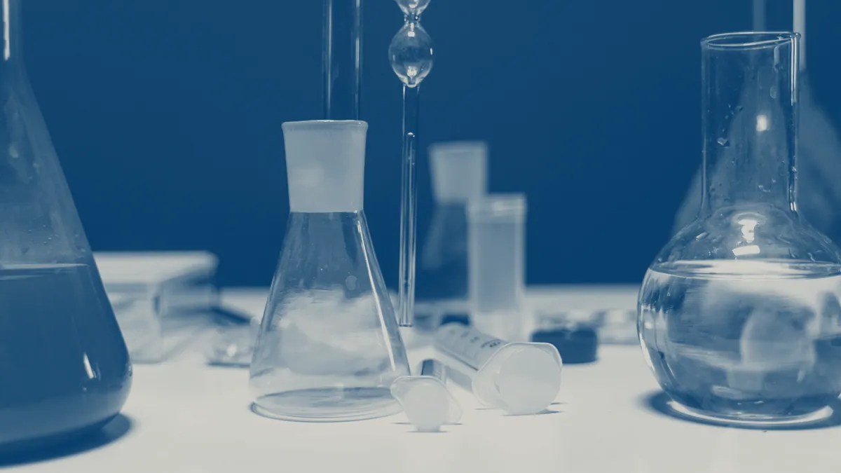 Glassware set out on a laboratory bench.
